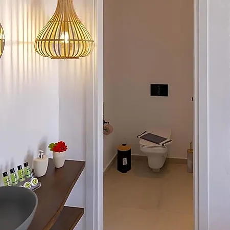 Отель Chrysonisos With Sunset & Seaviews Near Kini 4*